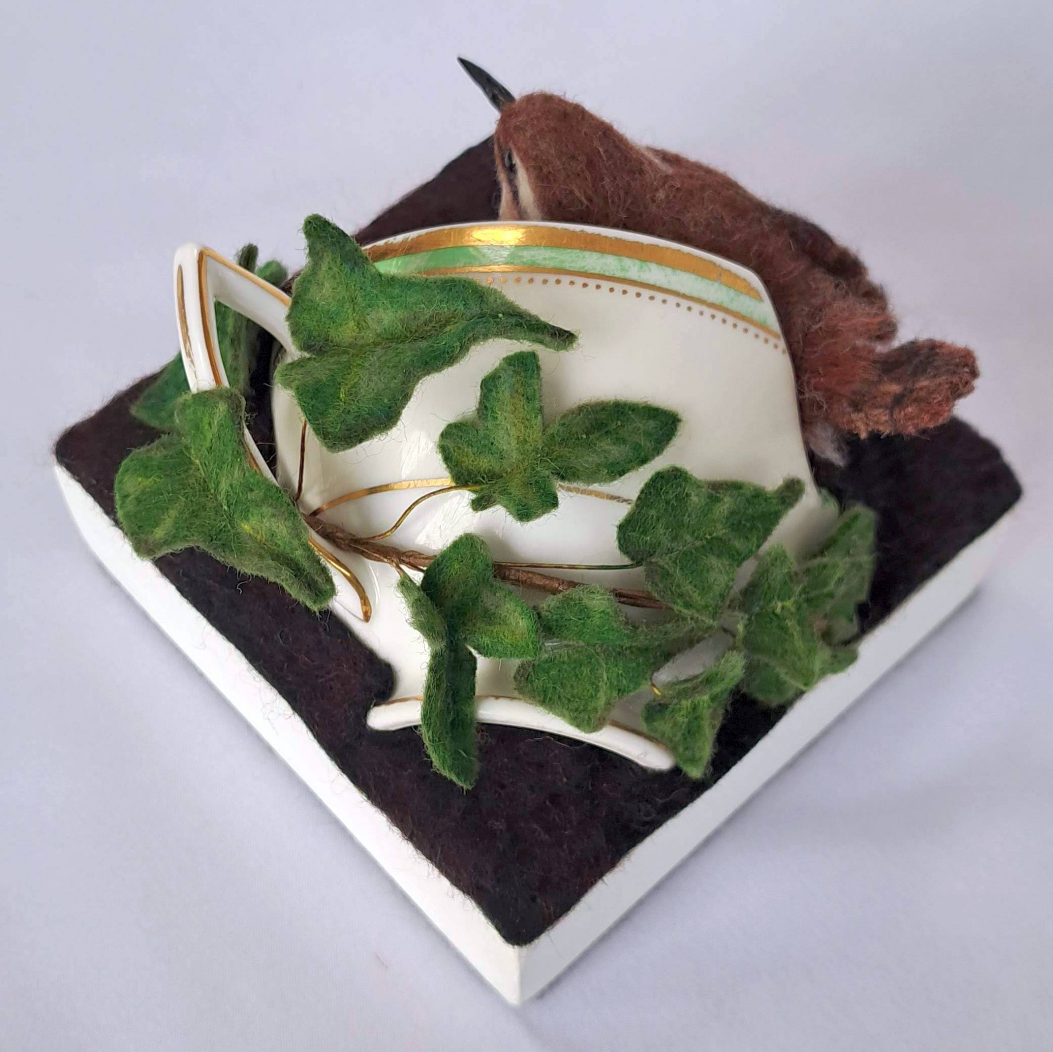 Wee Tea Jenny: Wren with china cup and vines. Unique handmade needle-felted wildlife sculpture. 