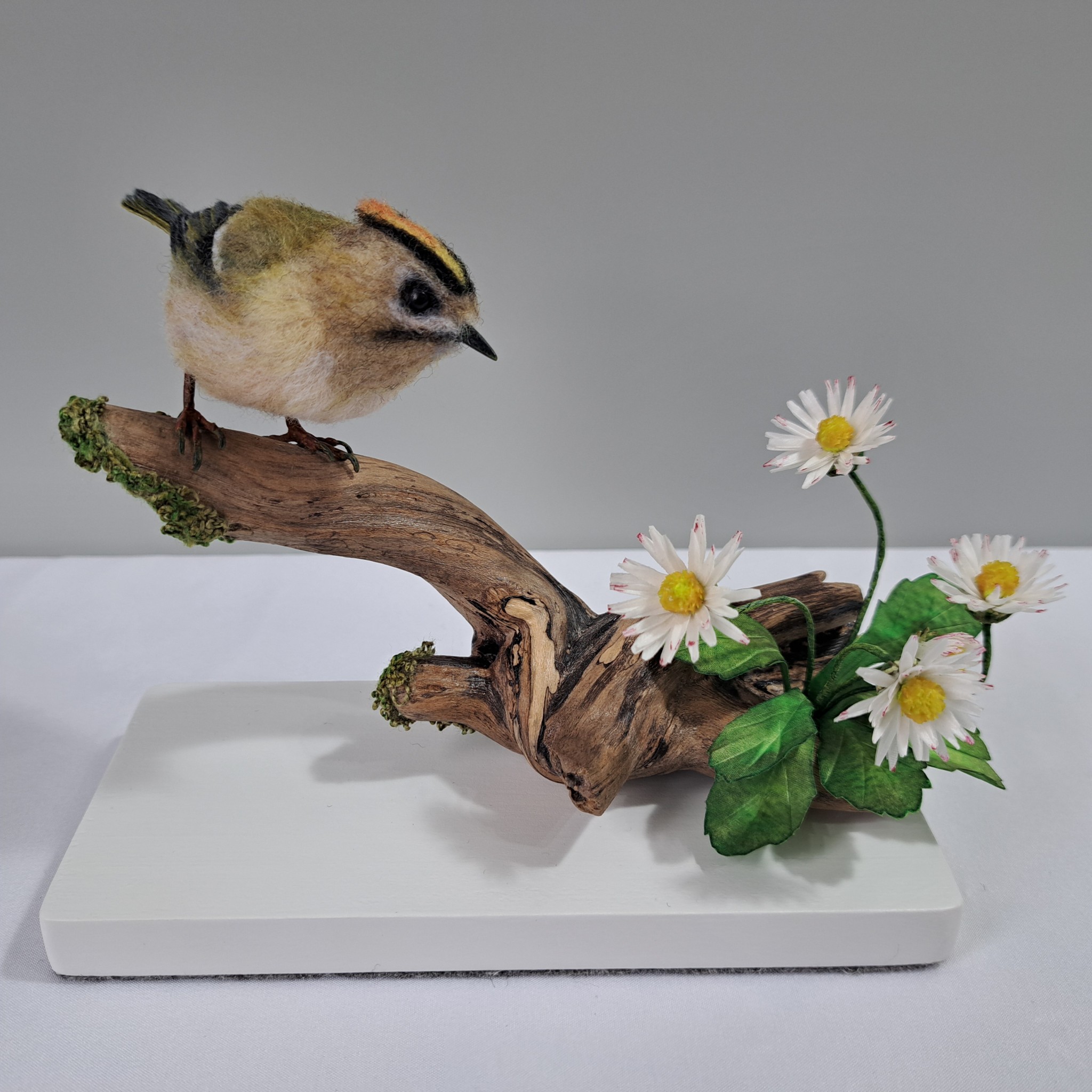 A moment with daises : Unique handmade needle-felted wildlife sculpture. Gold crested Wren with silk flowers