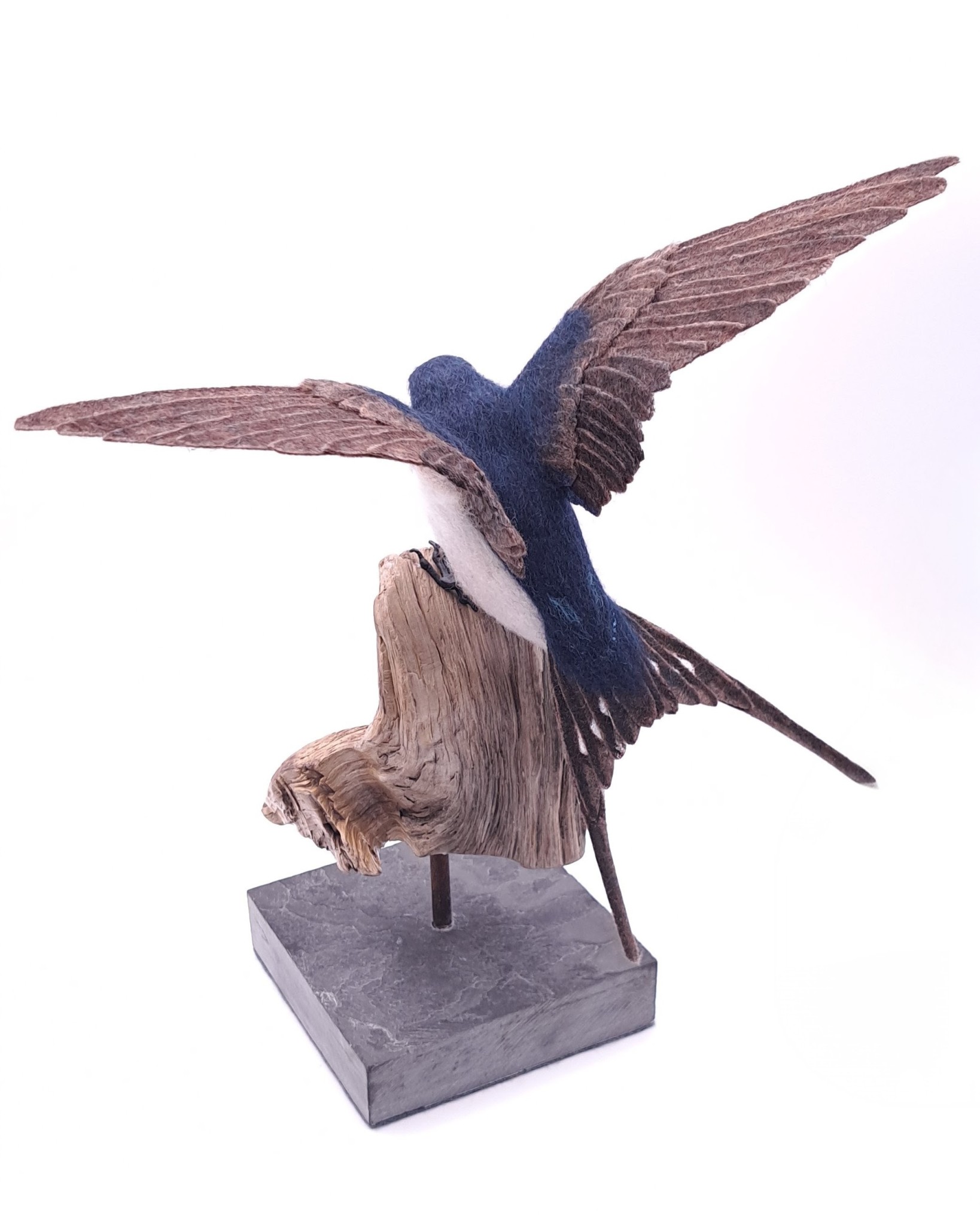 Needle felted swallow mounted on driftwood and slate.